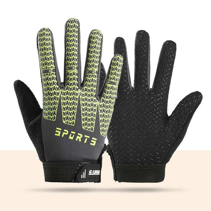 Black and green breathable cycling gloves for kids with silicone grip and shock-absorbing padding in M size
