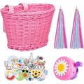 Children's bicycle basket with adjustable straps, floral bell, handlebar streamers, and animal stickers on a kids' bike