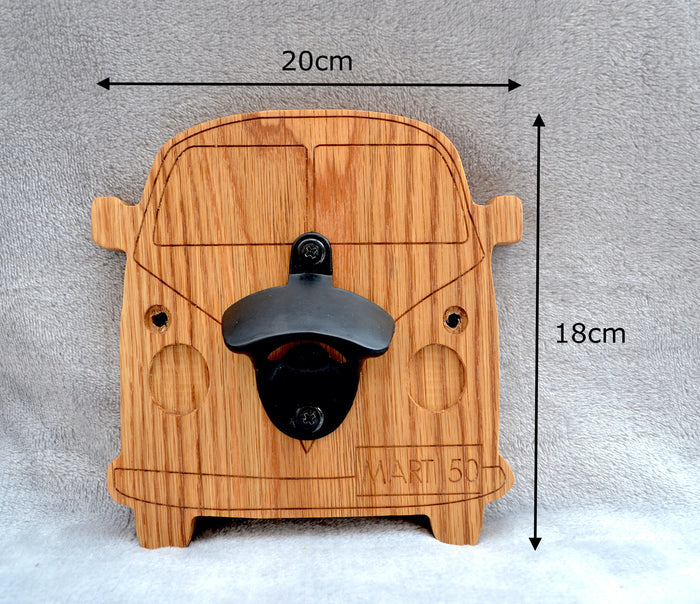 Wooden bottle opener with dimensions labelled on a gray background