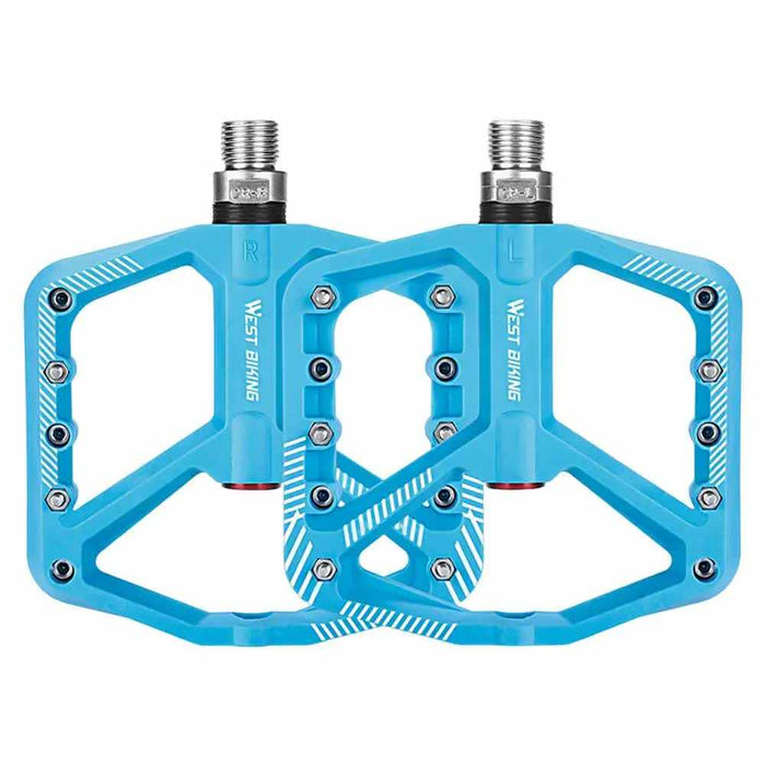 Blue wide bicycle pedals with non-slip surface and lightweight design